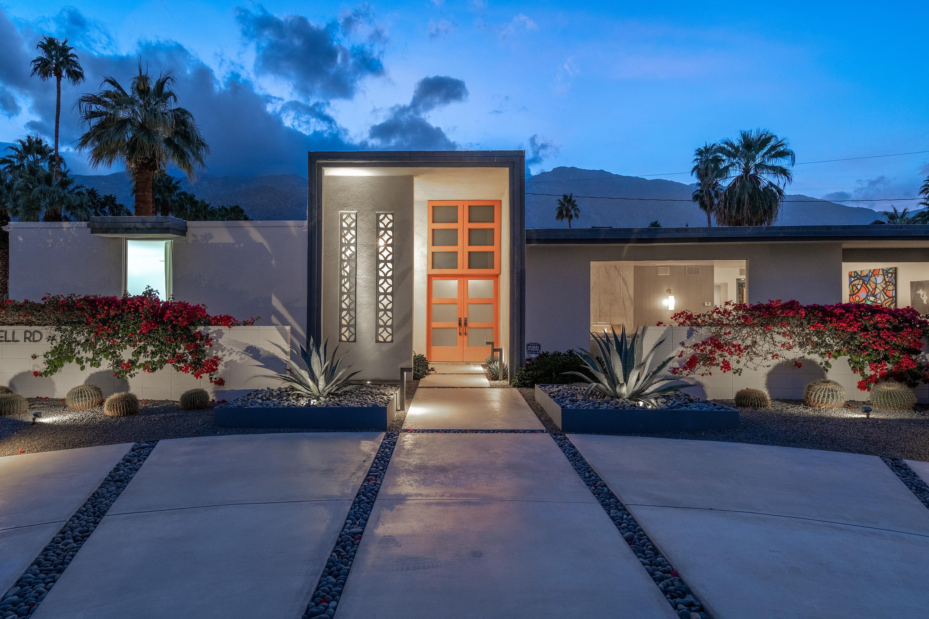 1130 East Deepwell Road Palm Springs, CA 92264 - Photo 38 of 55 a front view of a house with a yard