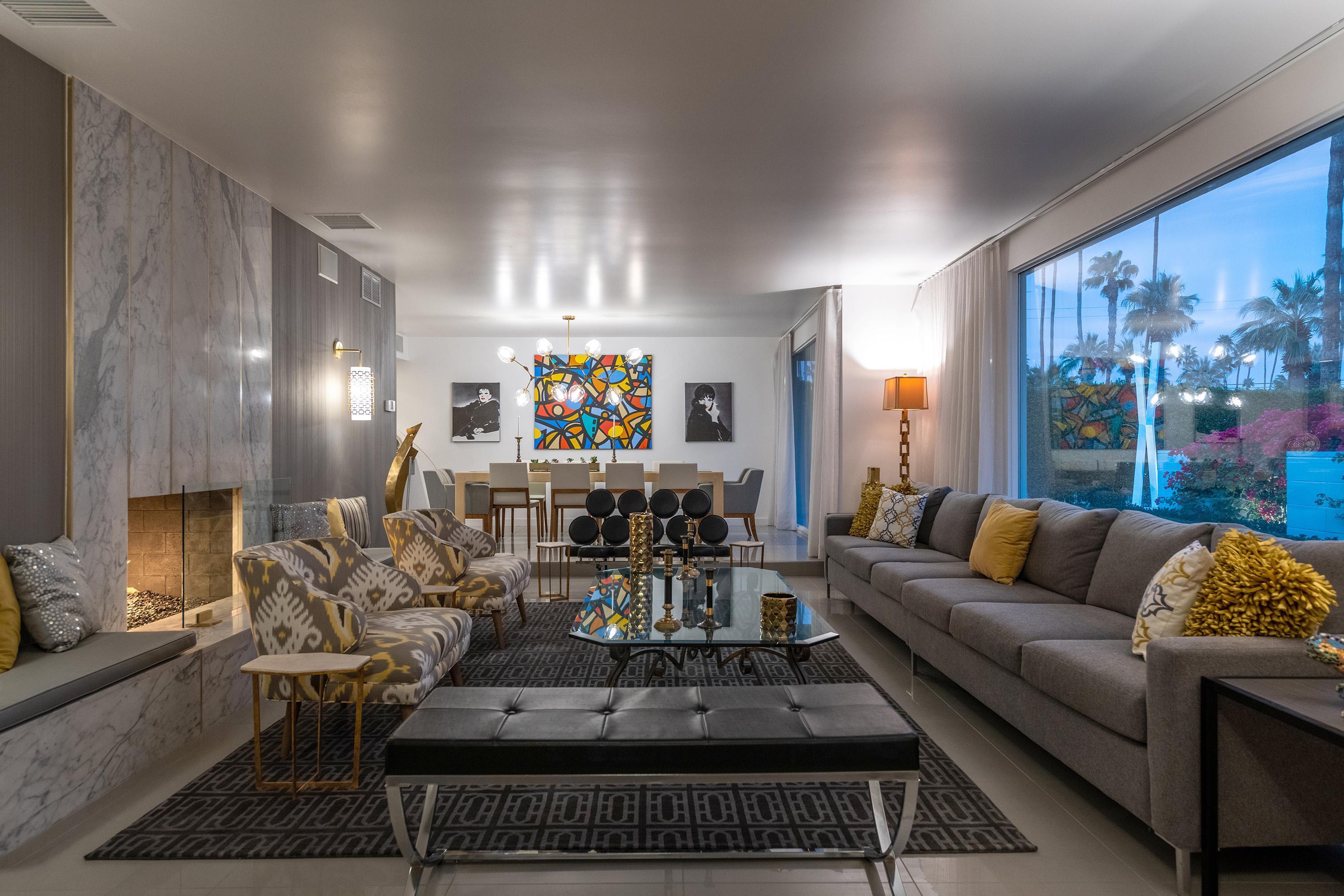 1130 East Deepwell Road Palm Springs, CA 92264 - Photo 39 of 55 a living room with furniture and a large window