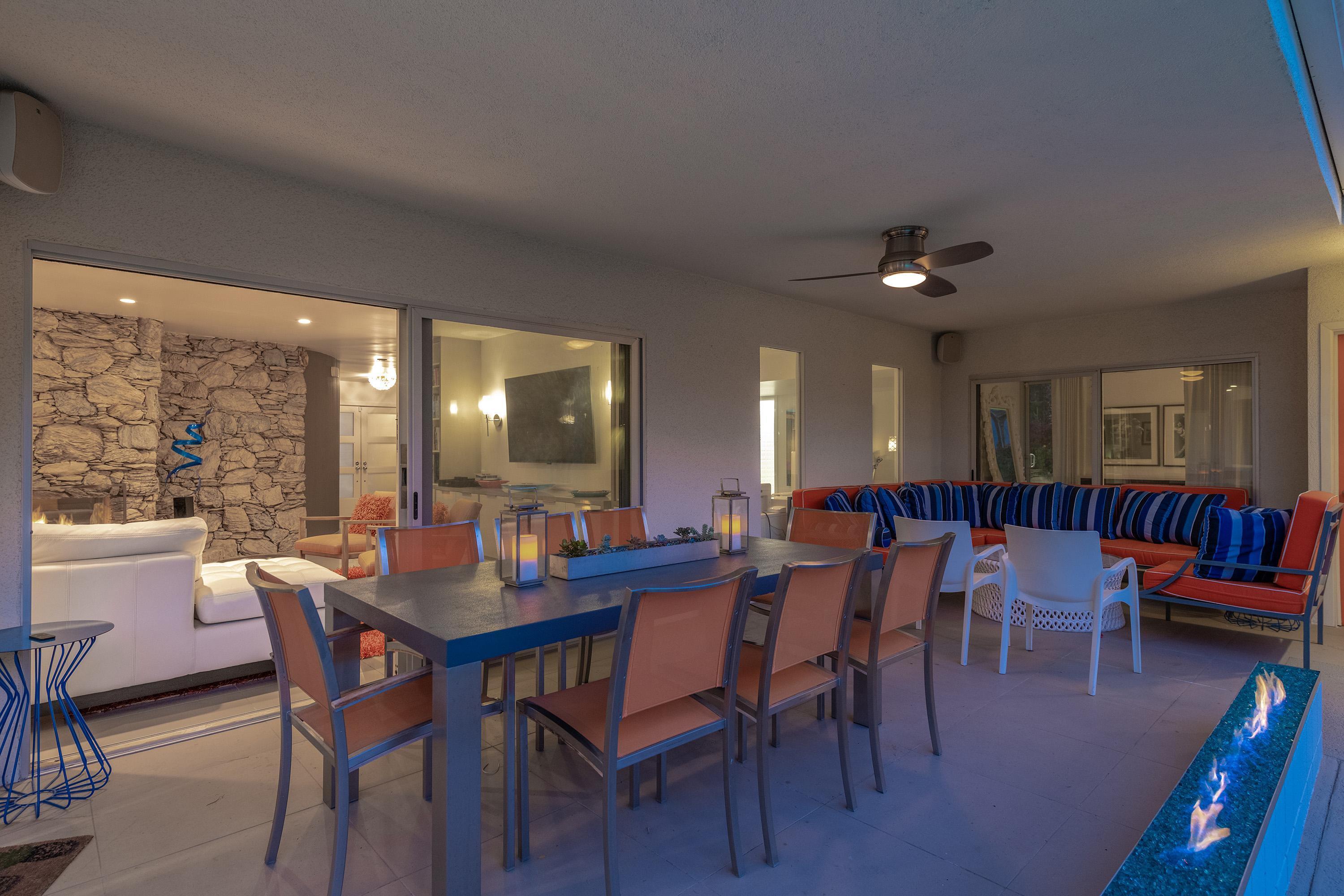 1130 East Deepwell Road Palm Springs, CA 92264 - Photo 45 of 55 a dining room with furniture window and wooden floor