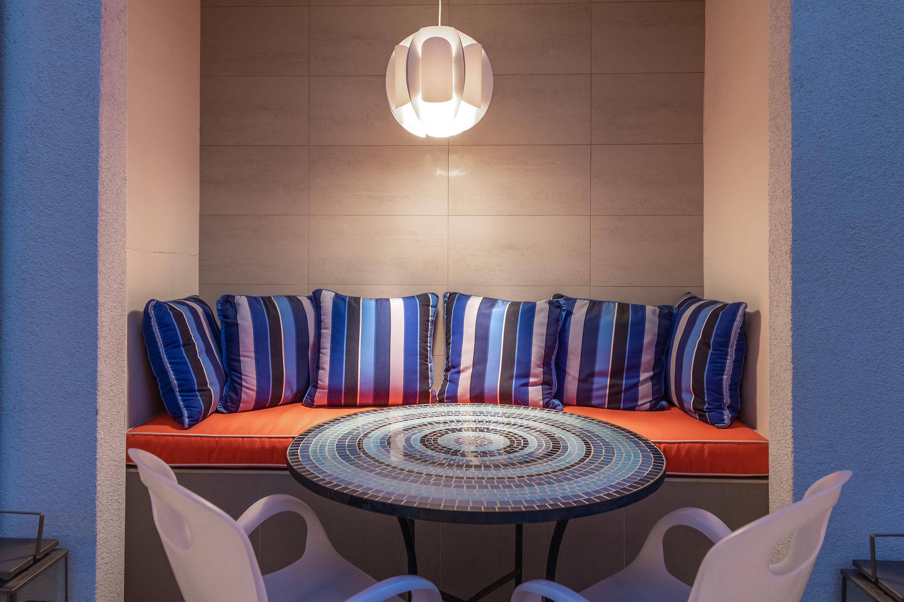 1130 East Deepwell Road Palm Springs, CA 92264 - Photo 47 of 55 a view of a dining room with furniture