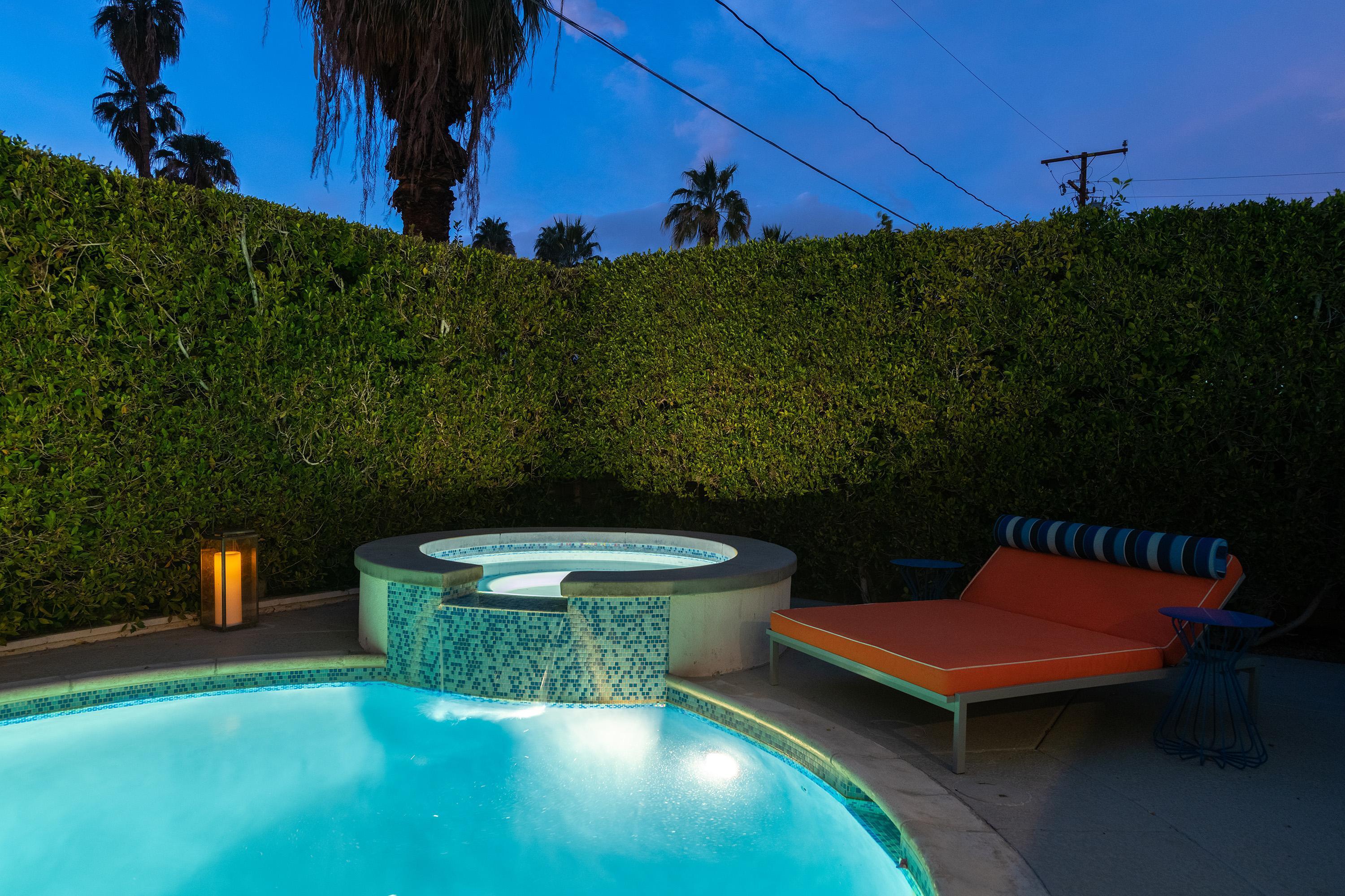 1130 East Deepwell Road Palm Springs, CA 92264 - Photo 51 of 55 a view of a chairs and table in the patio