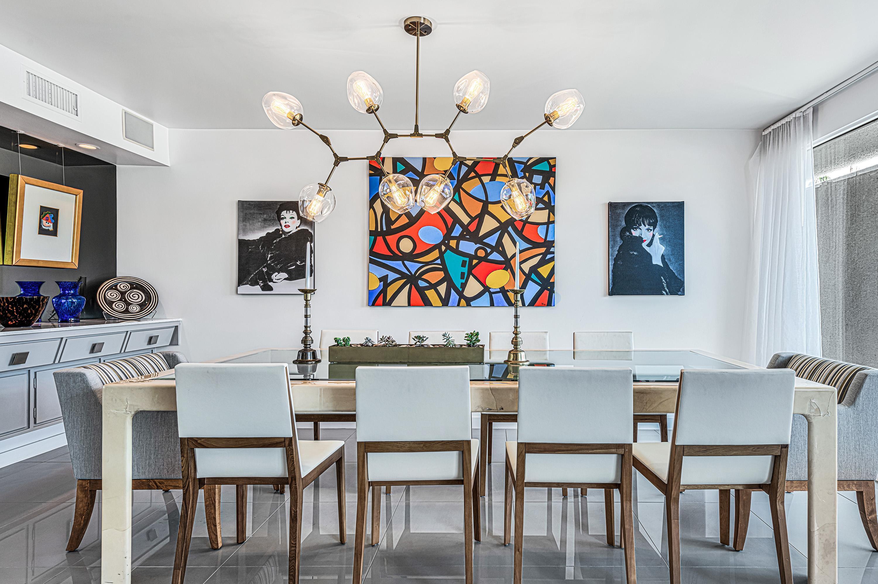 1130 East Deepwell Road Palm Springs, CA 92264 - Photo 7 of 55 a view of a dining room with furniture and wooden floor