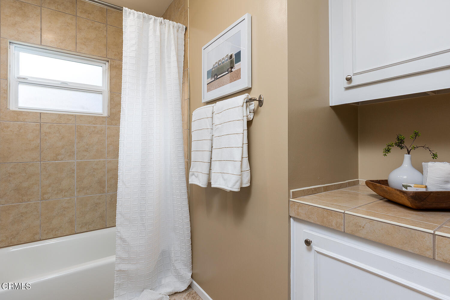 2250 Cooley Place Pasadena, CA 91104 - Photo 22 of 31 a bathroom with a bathtub and a shower