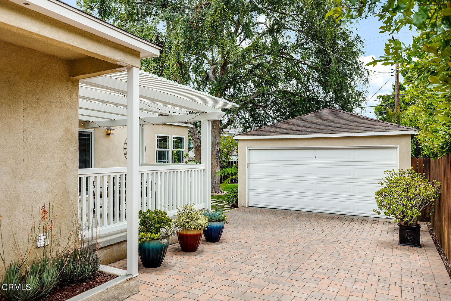 2250 Cooley Place Pasadena, CA 91104 - Photo 27 of 31 a front view of a house with garden
