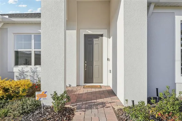 a view of a entryway door front of house