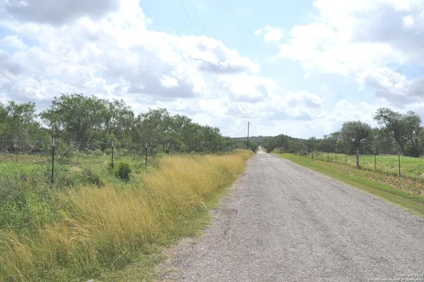 a view of a lake from a yard