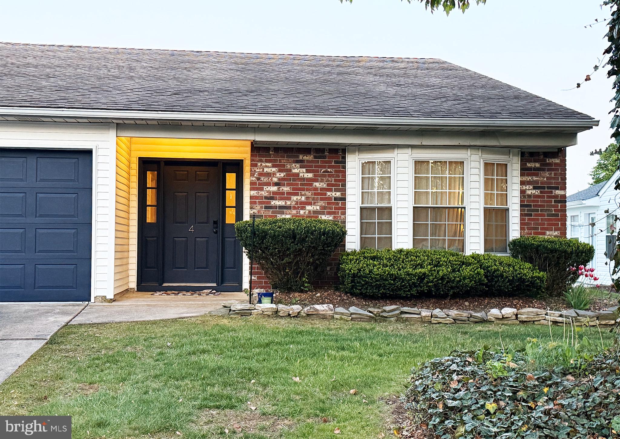 4 Fireside Circle Columbus, NJ 08022 - Photo 1 of 15 a front view of a house with a yard