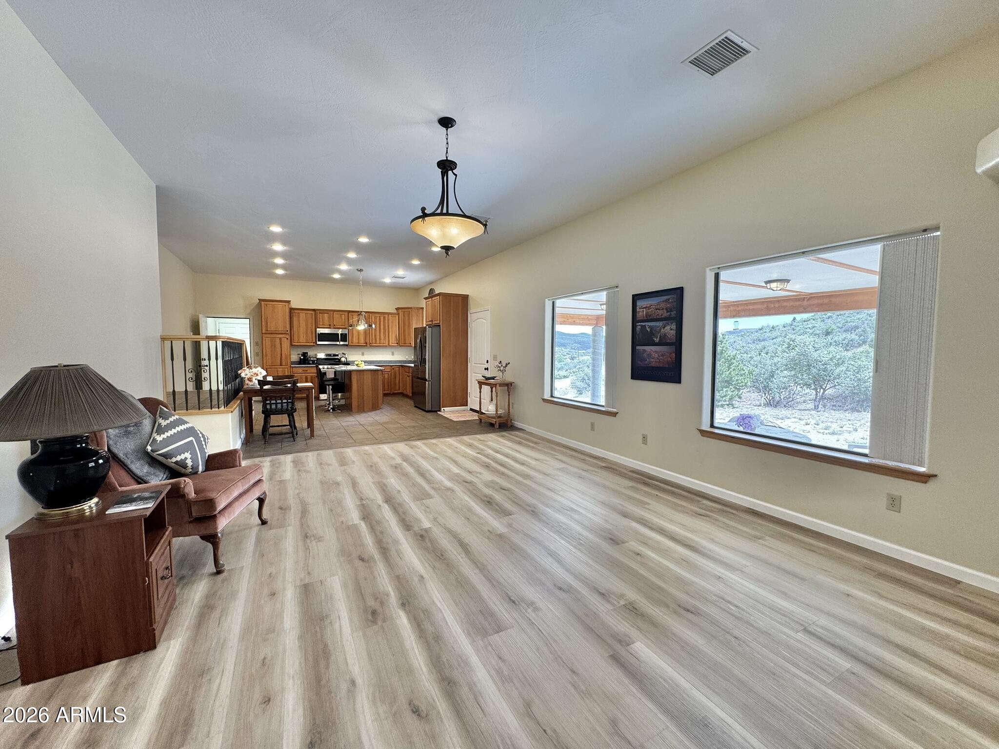 18168 Spoon Road Kirkland, AZ 86332 - Photo 25 of 59 a view of a living room and dining room