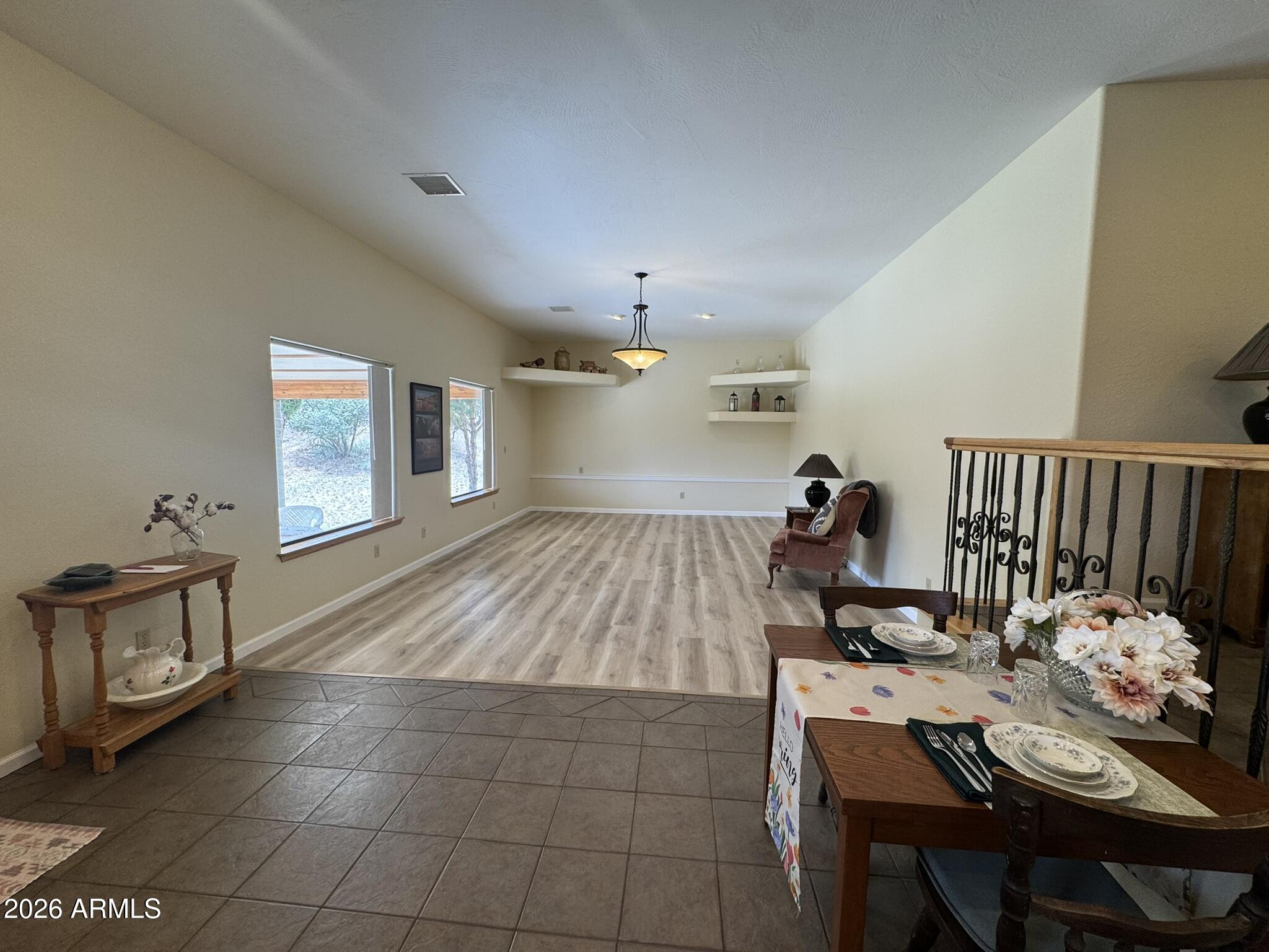 18168 Spoon Road Kirkland, AZ 86332 - Photo 59 of 59 a living room with furniture and a dining table
