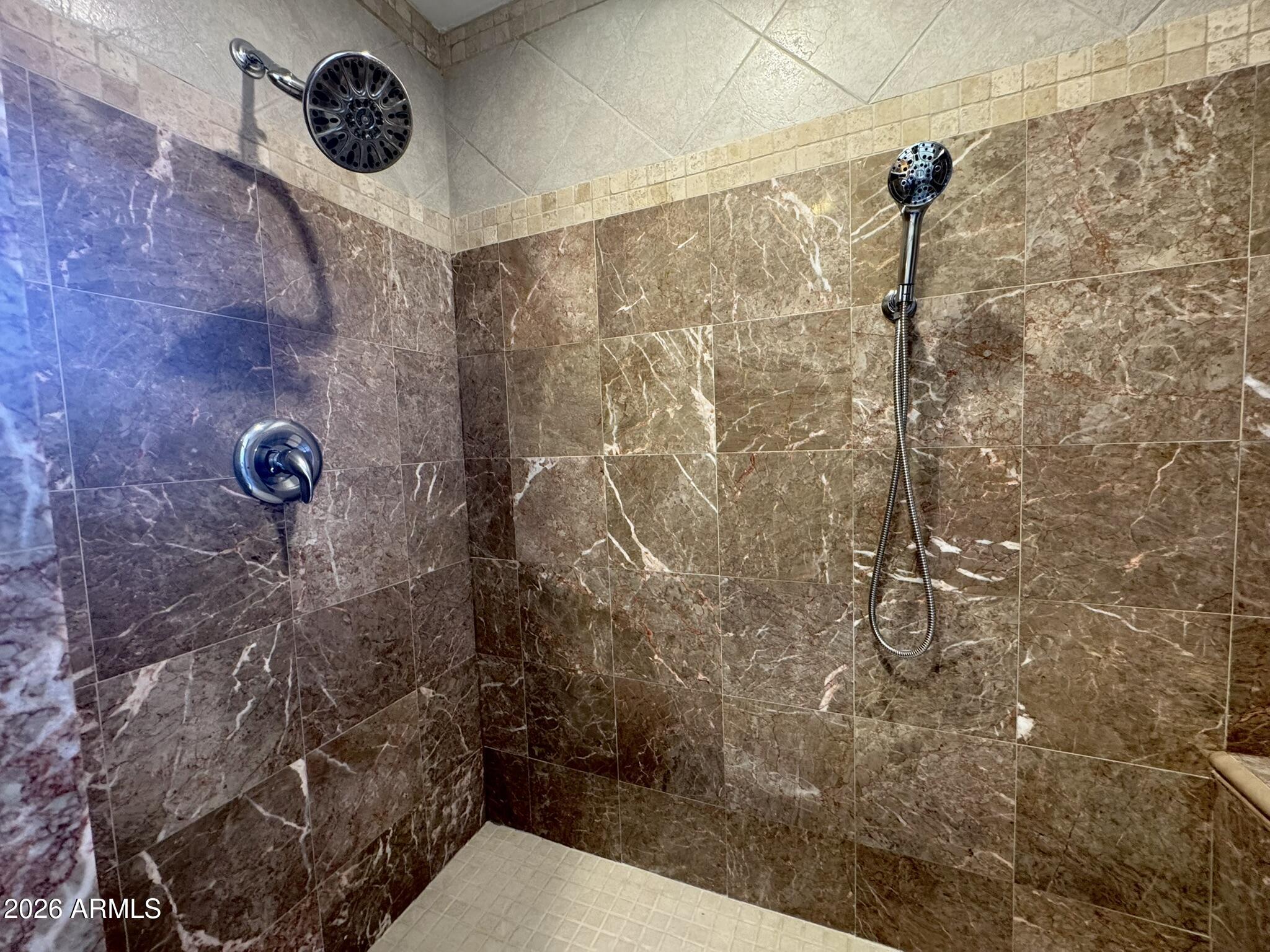 18168 Spoon Road Kirkland, AZ 86332 - Photo 37 of 59 a bathroom with a shower