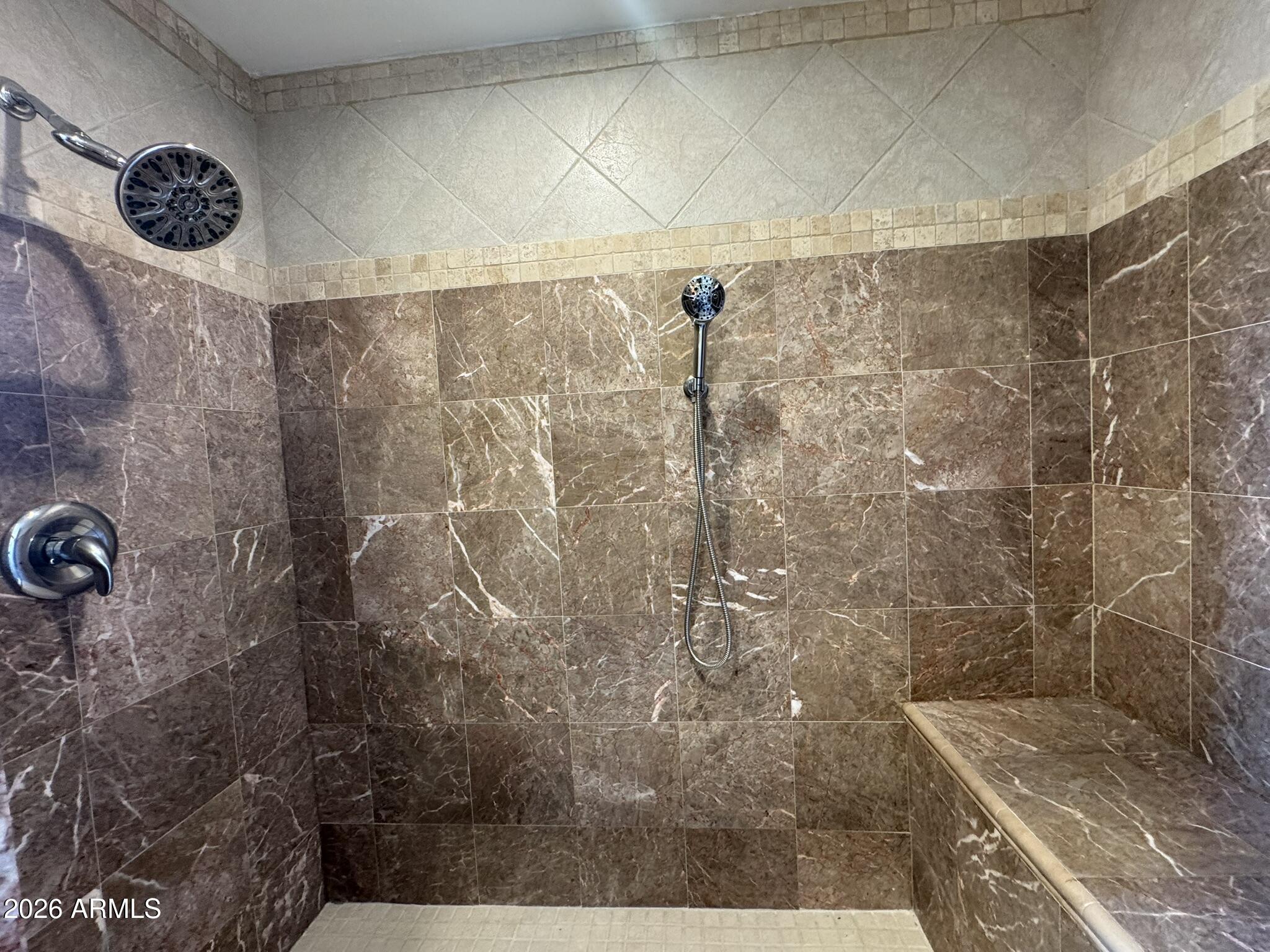 18168 Spoon Road Kirkland, AZ 86332 - Photo 39 of 59 a bathroom with a shower