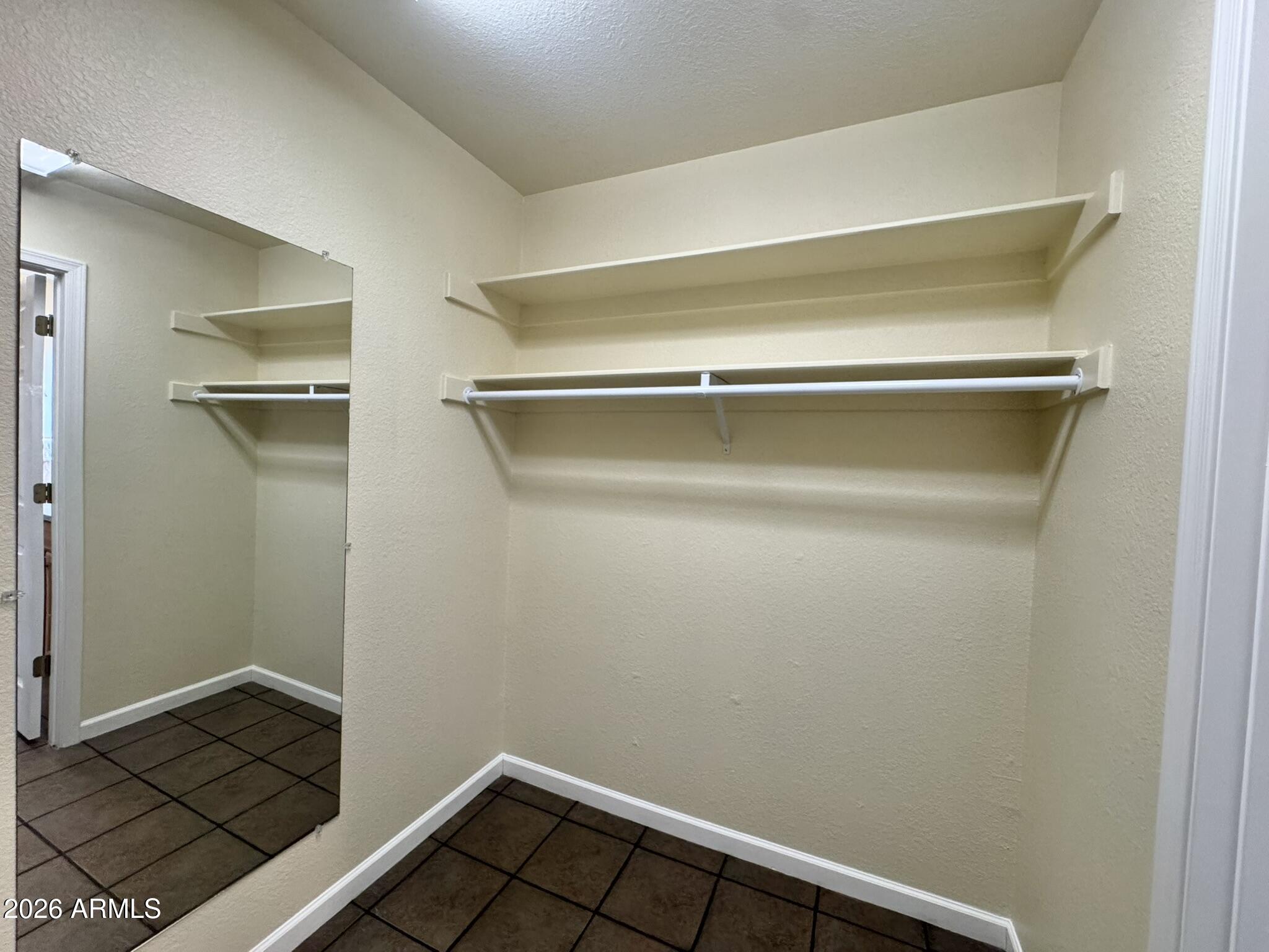 18168 Spoon Road Kirkland, AZ 86332 - Photo 40 of 59 Primary walk in closet