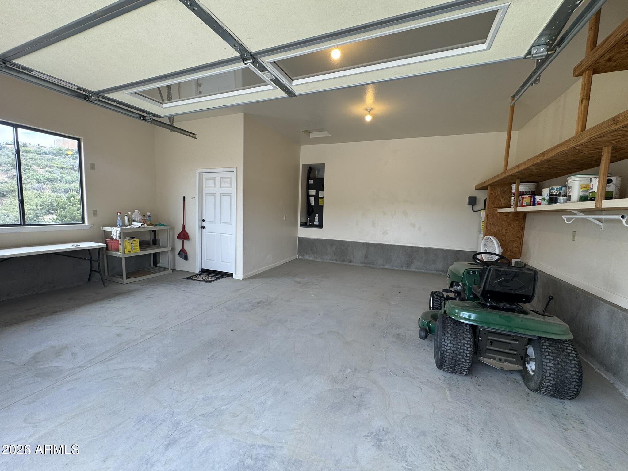 18168 Spoon Road Kirkland, AZ 86332 - Photo 50 of 59 a room with furniture and a window