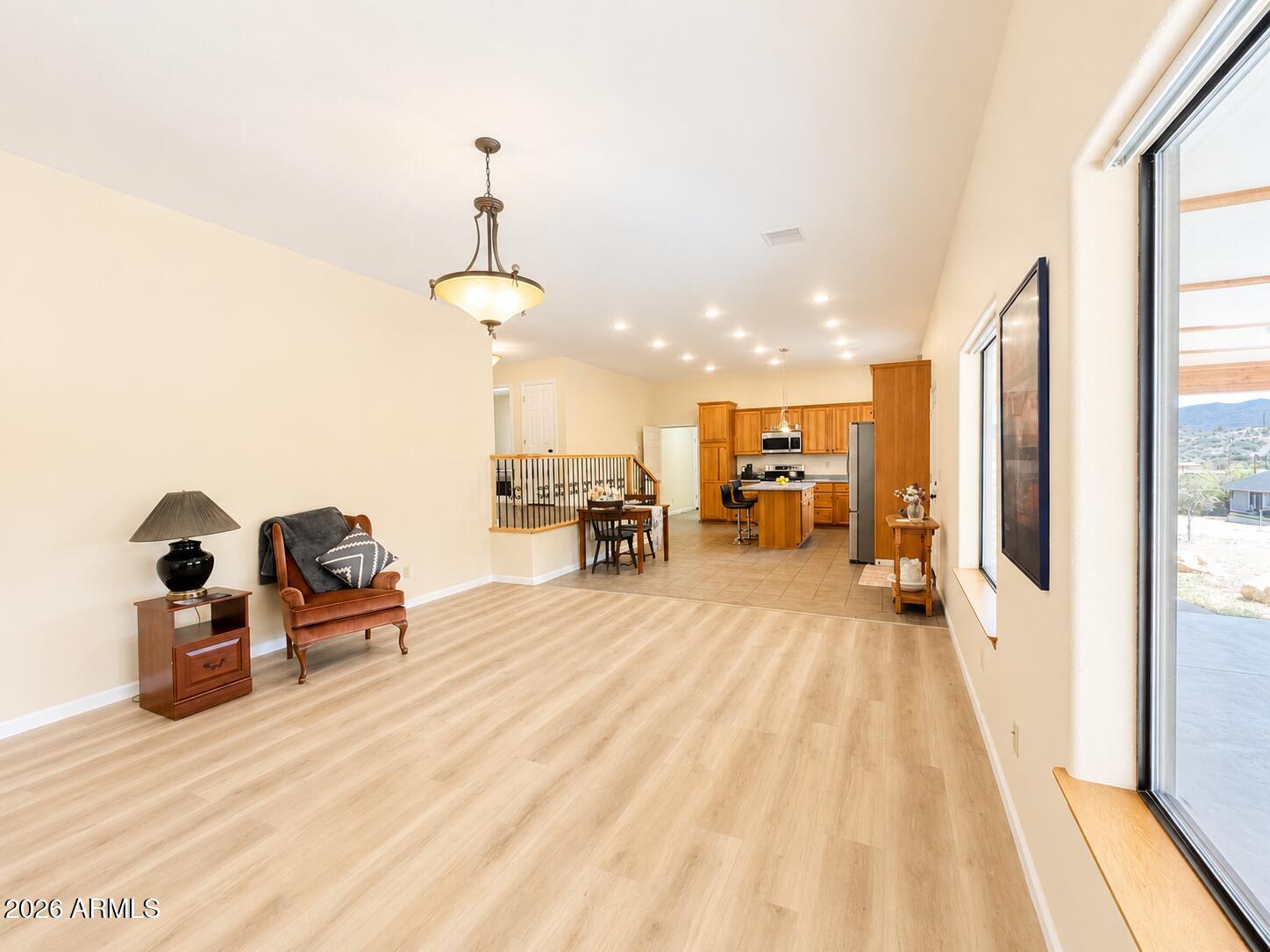 18168 Spoon Road Kirkland, AZ 86332 - Photo 55 of 59 Great room to kitchen