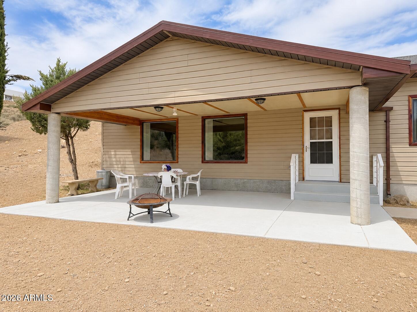 18168 Spoon Road Kirkland, AZ 86332 - Photo 7 of 59 a view of a terrace with seating space