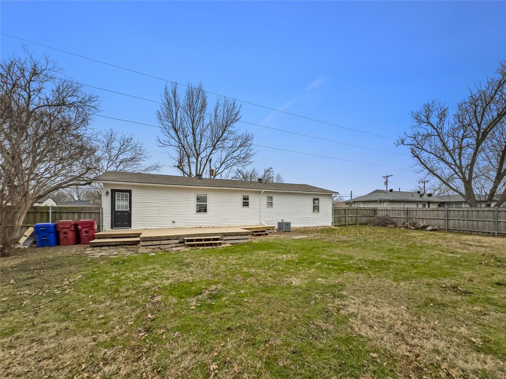 208 West County Line Road Royse City, TX 75189 - Photo 12 of 14 Spacious backyard for entertaining with plenty of privacy.