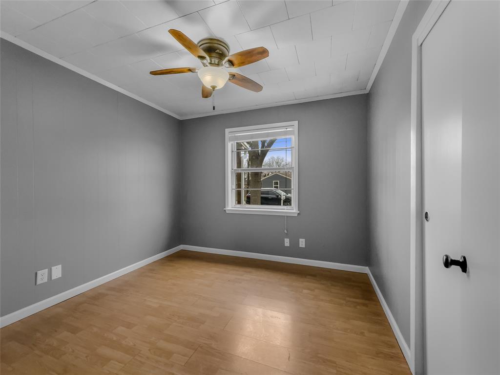 208 West County Line Road Royse City, TX 75189 - Photo 7 of 14 Large bedrooms with wood floors