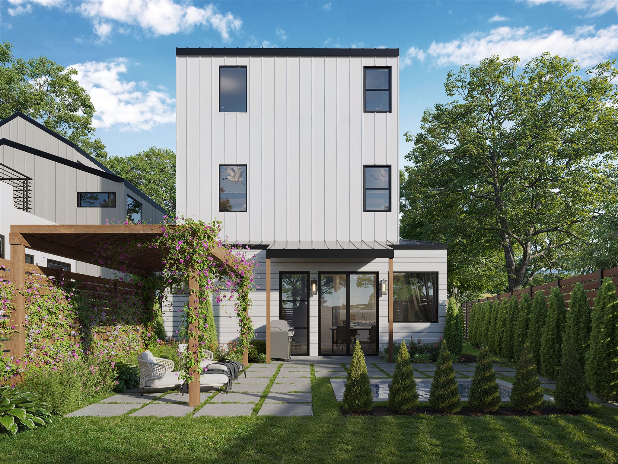 Modern vertical siding highlights the sleek architectural lines of this multi-story residence.