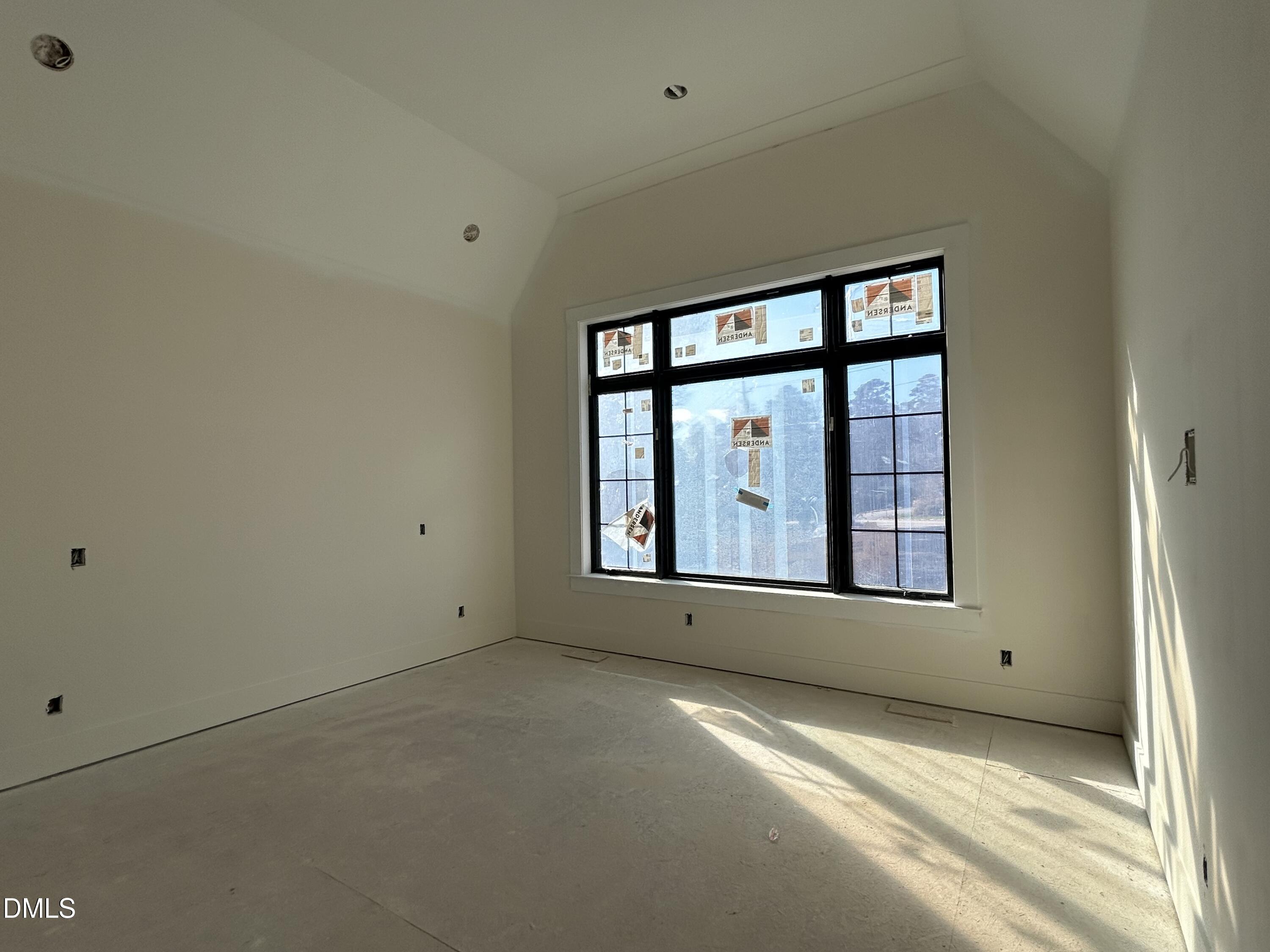 105 Edenburgh Road Raleigh, NC 27608 - Photo 14 of 26 a view of an empty room with a window