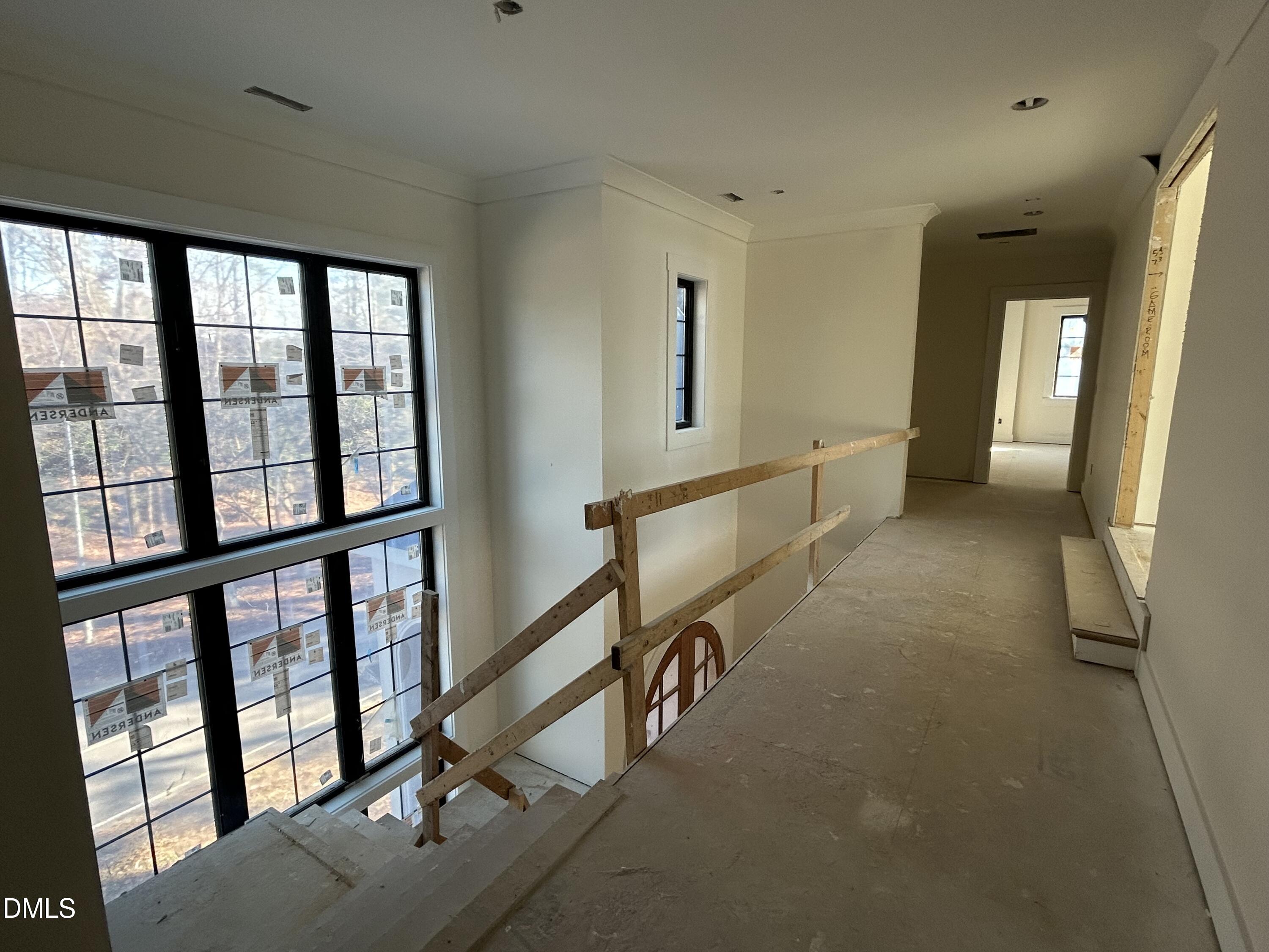 105 Edenburgh Road Raleigh, NC 27608 - Photo 18 of 26 a view of a hallway with windows