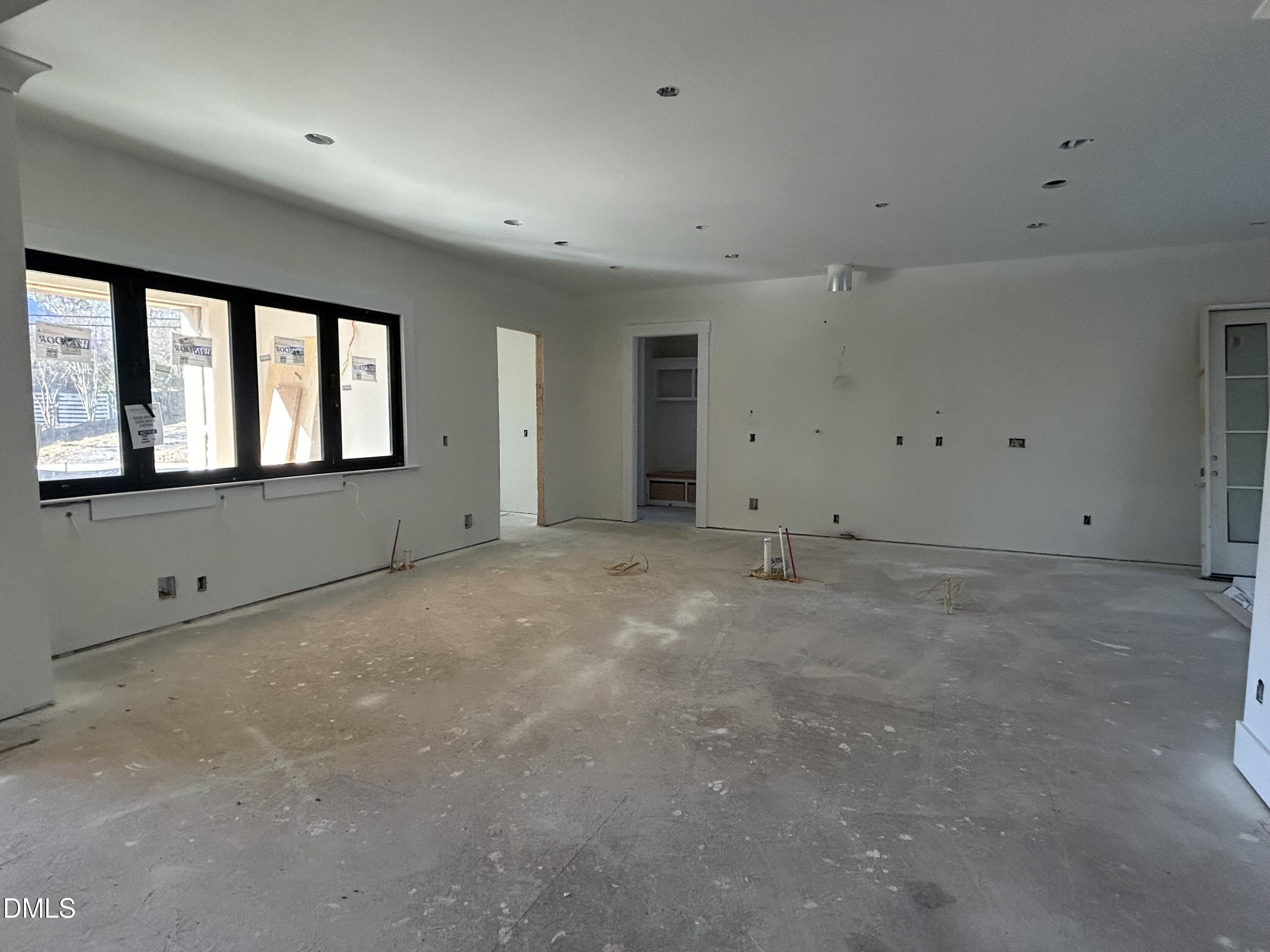 105 Edenburgh Road Raleigh, NC 27608 - Photo 8 of 26 a view of an empty room with a window