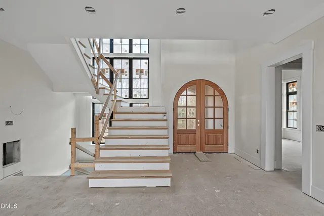 a room with washing machine and sink