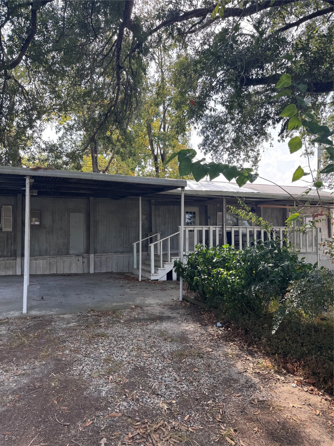 251 Ramp Way Trinity, TX 75862 - Photo 17 of 18 a front view of house with a garden