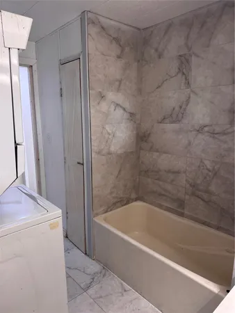a bathroom with a bathtub