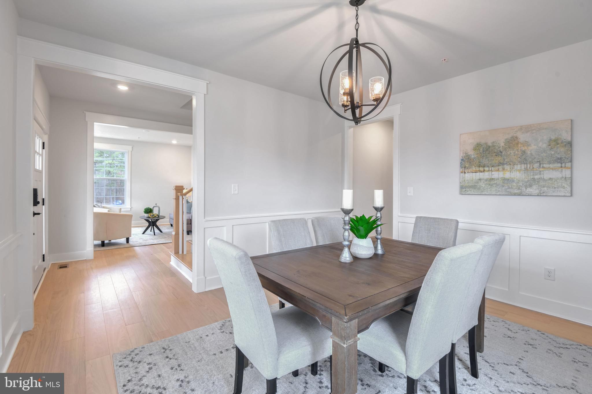 Eliana Court Laurel, MD 20708 - Photo 17 of 46 a view of a dining room with furniture and wooden floor
