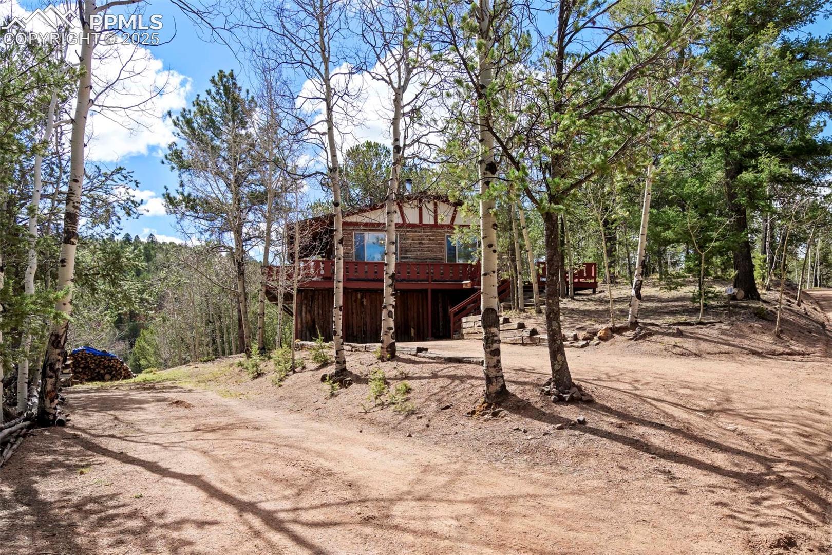 View of yard with a deck