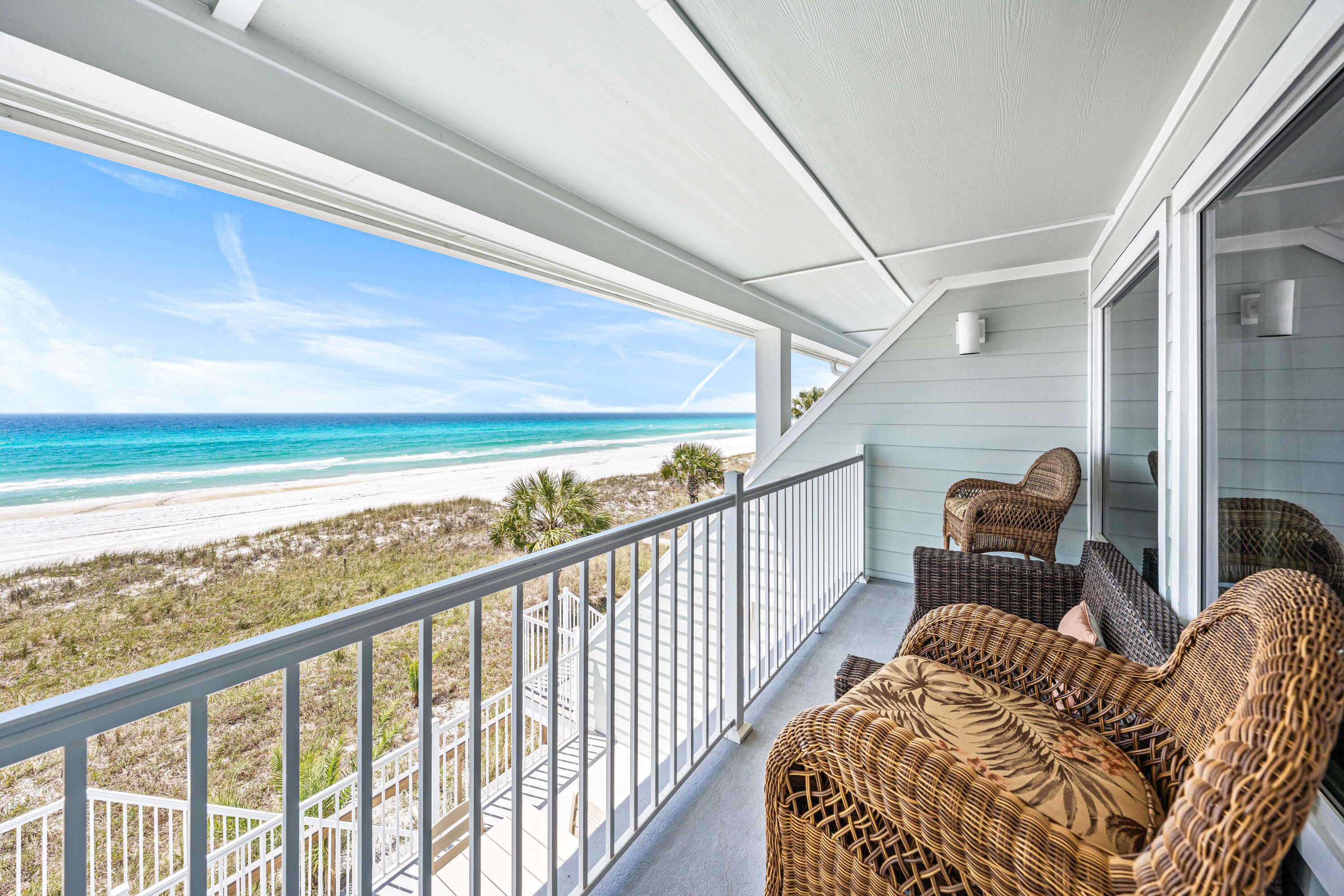 22519 Front Beach Road, Unit 108 Panama City Beach, FL 32413 - Photo 3 of 38 a view of a balcony with furniture