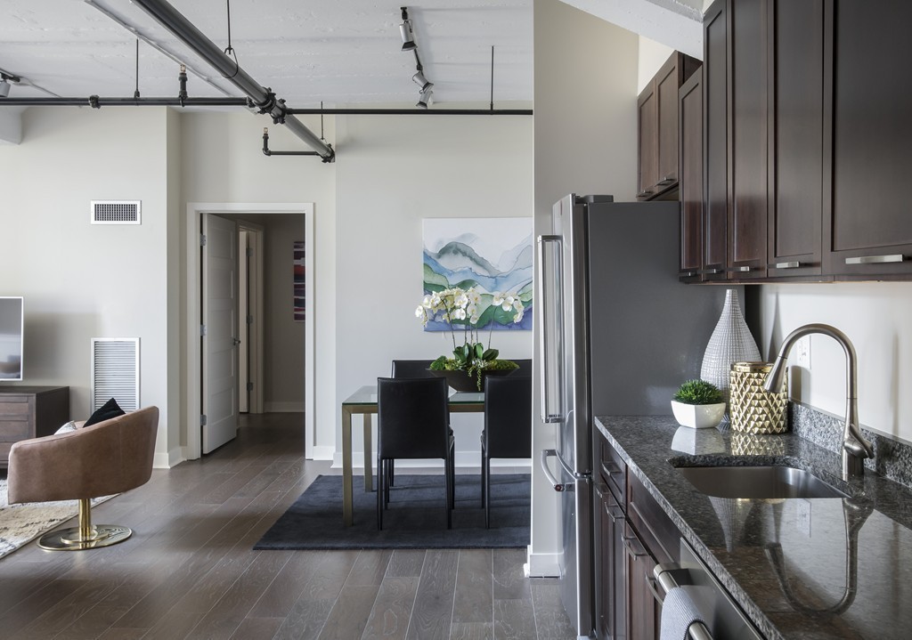 166 Terrace Street, Unit 401 Boston, MA 02120 - Photo 1 of 19 a kitchen with stainless steel appliances granite countertop a refrigerator and a sink
