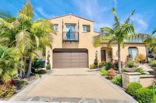 a outdoor space with patio the couches and a potted plant