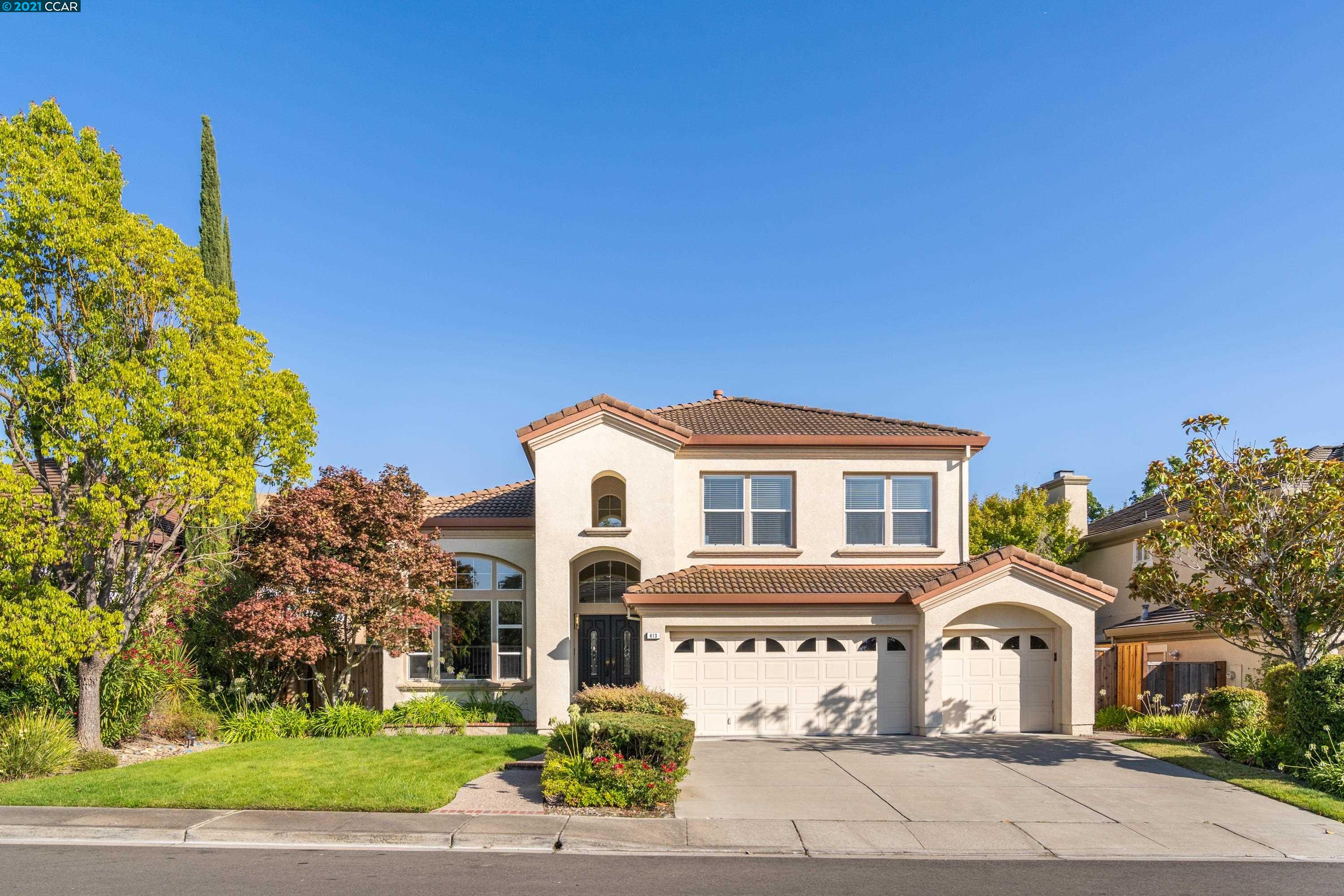 613 Sunflower Court San Ramon, CA 94582 - Photo 1 of 1 a front view of a house with a yard