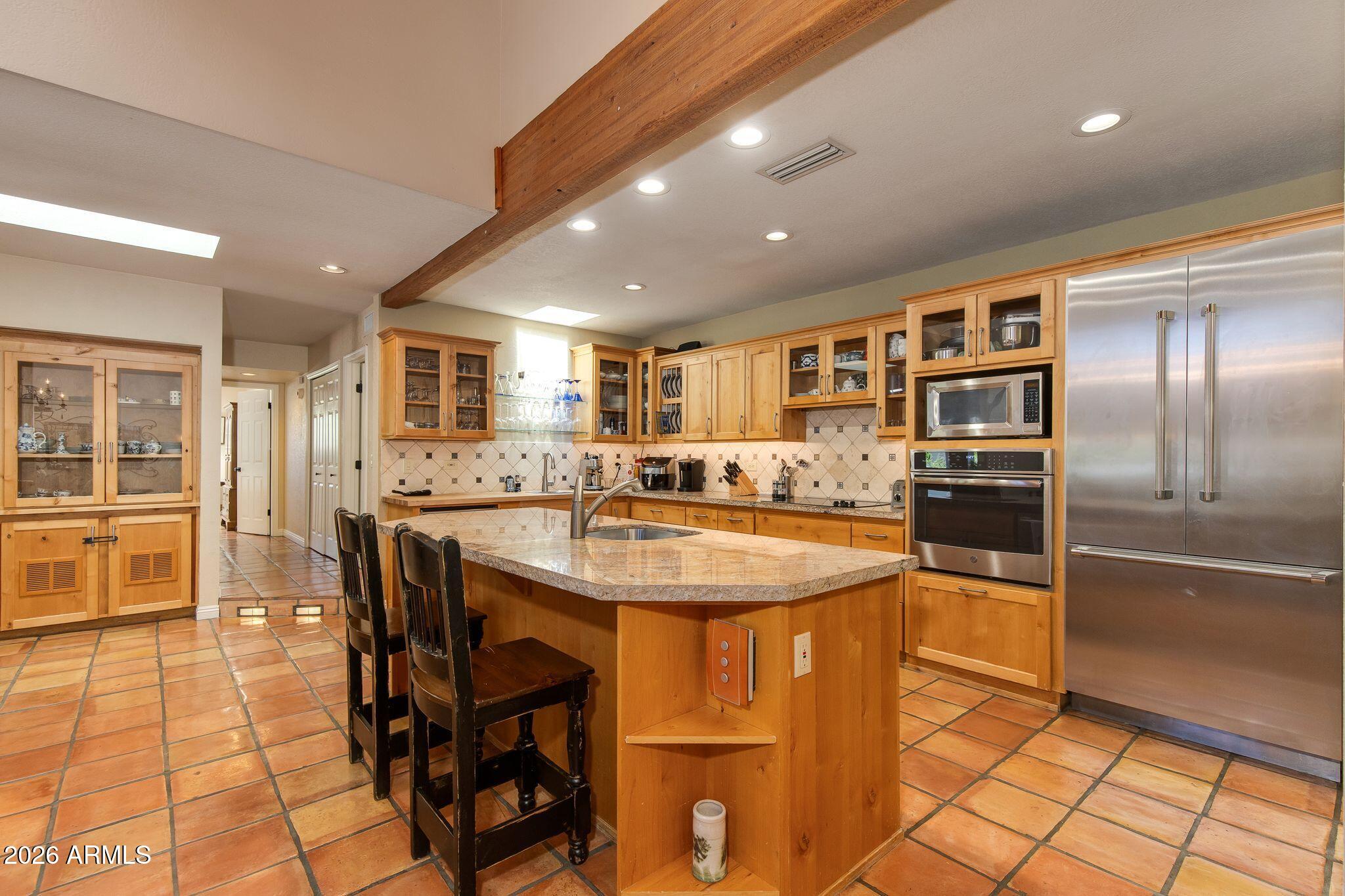 6186 North 28th Place Phoenix, AZ 85016 - Photo 5 of 17 Kitchen Island