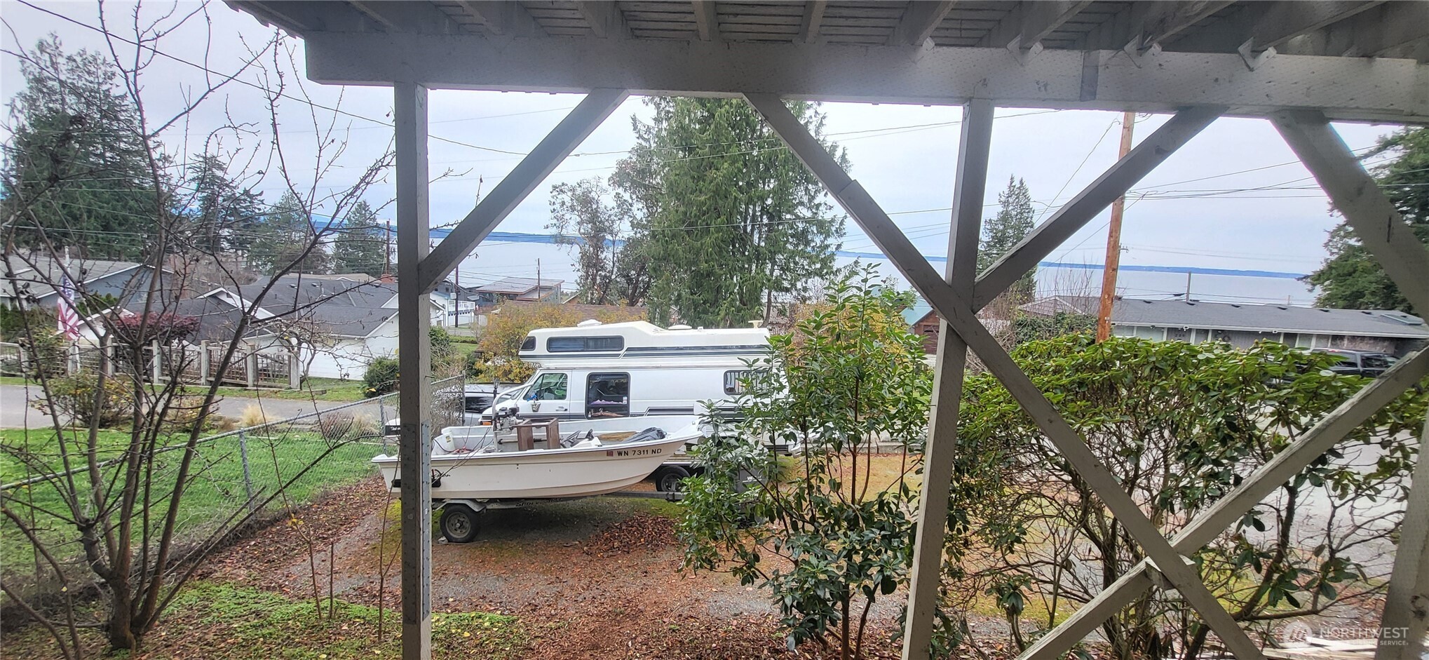281 North Maple Street, Unit B Camano Island, WA 98282 - Photo 14 of 14 a view of house with backyard and sitting area