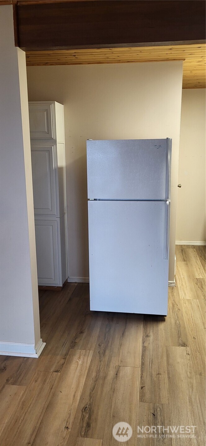 281 North Maple Street, Unit B Camano Island, WA 98282 - Photo 6 of 14 a view of wooden floor