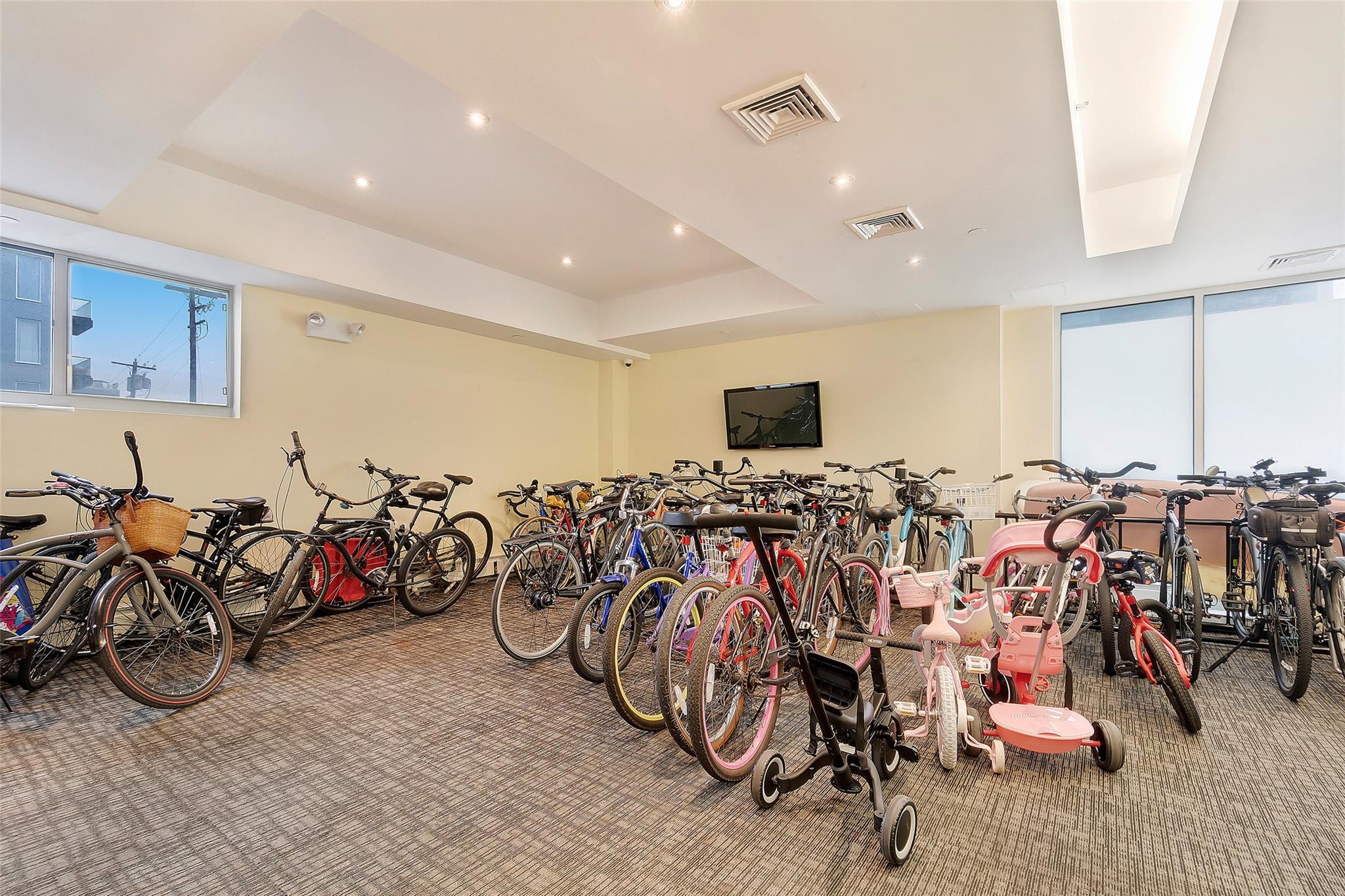 151 Beach 96th Street, Unit 5D Queens, NY 11693 - Photo 18 of 18 Garage featuring recessed lighting, visible vents, and bike storage