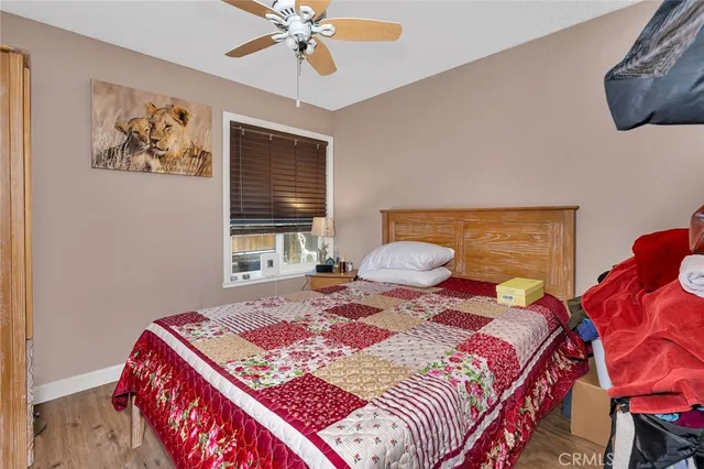 a view of swimming pool with outdoor seating and a tub