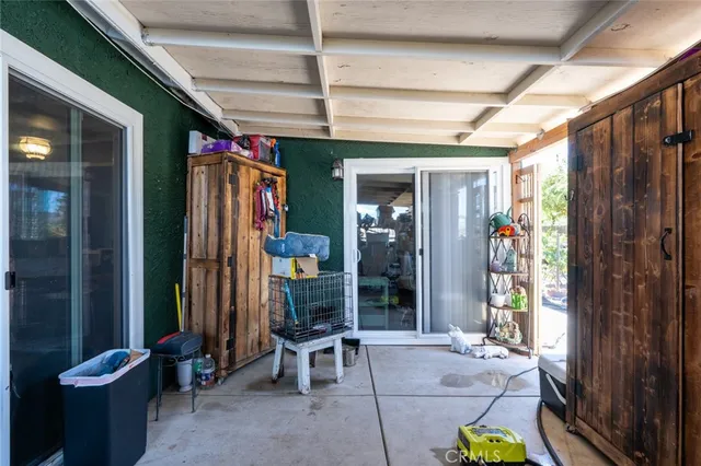 a view of a terrace with sitting area