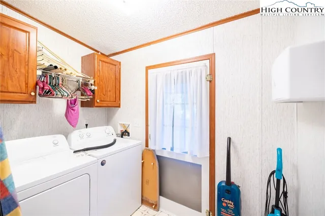 a view of a green field with lots of bushes