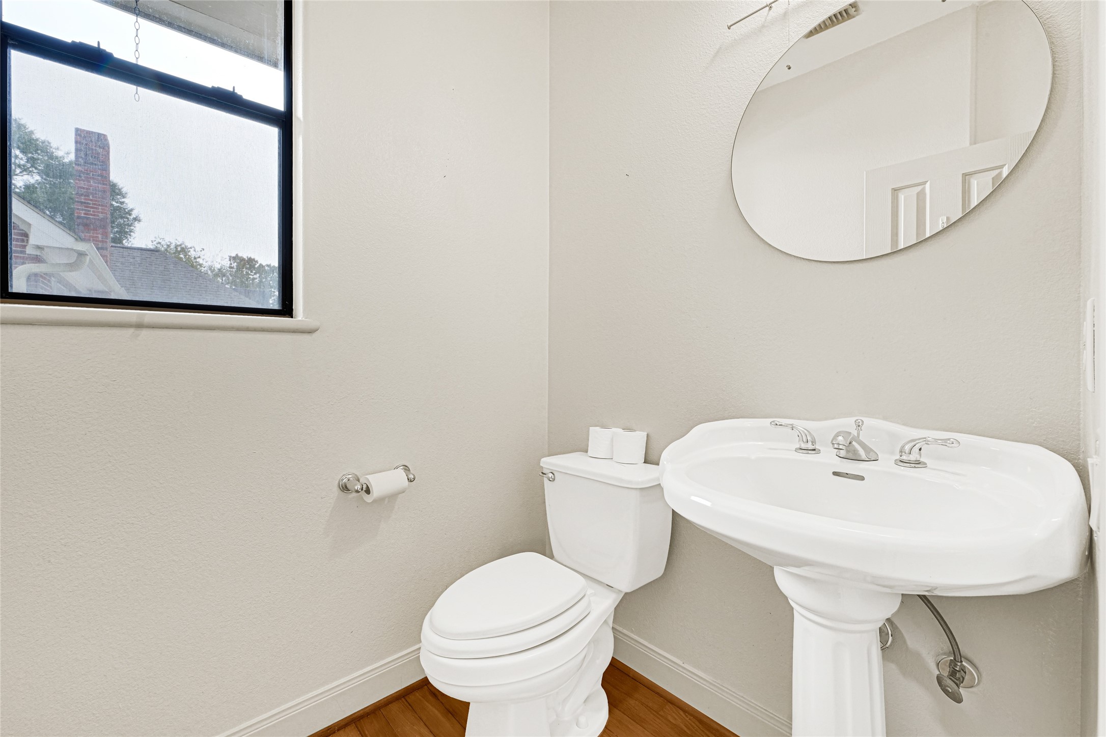 2414 Calumet Street, Unit B Houston, TX 77004 - Photo 15 of 27 a bathroom with a sink and a mirror