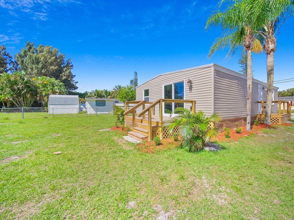 1774 Southwest College Street Stuart, FL 34997 - Photo 12 of 15 Back porch-yard