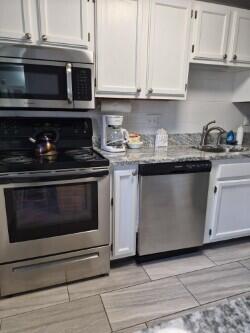 1373 Post Road, Unit 4E Wells, ME 04090 - Photo 24 of 31 4E KITCHEN