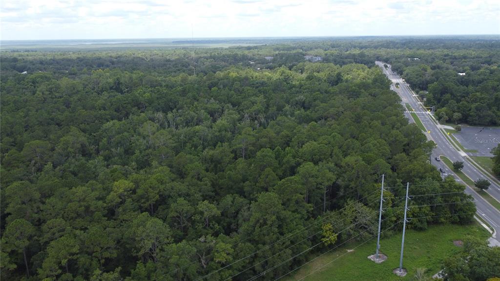 Southeast 22nd Avenue Gainesville, FL 32641 - Photo 2 of 8 an aerial view of residential houses with outdoor space and trees