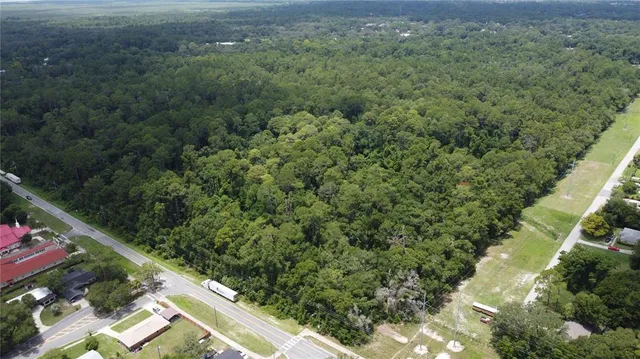 an aerial view of residential house with outdoor space