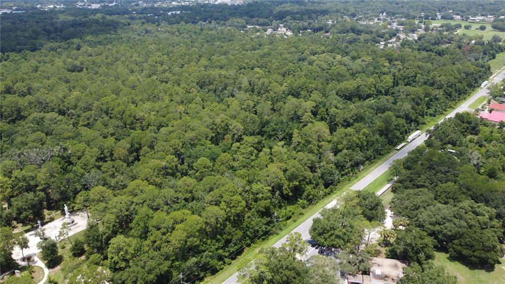 Southeast 22nd Avenue Gainesville, FL 32641 - Photo 7 of 8 a view of a city with lush green forest