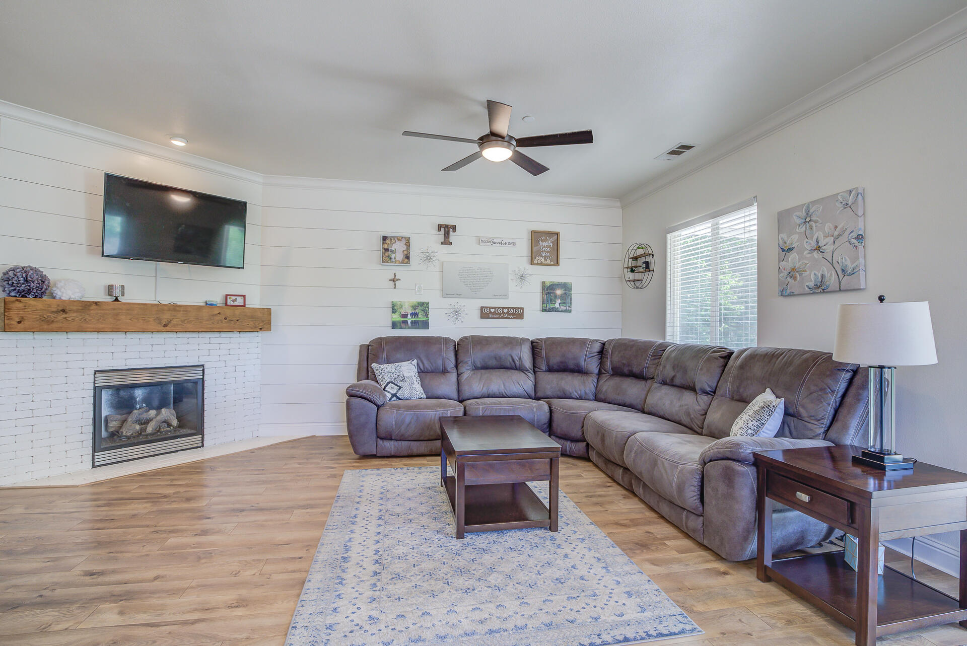 4090 Cambria Drive Redding, CA 96002 - Photo 16 of 48 a living room with furniture and a flat screen tv