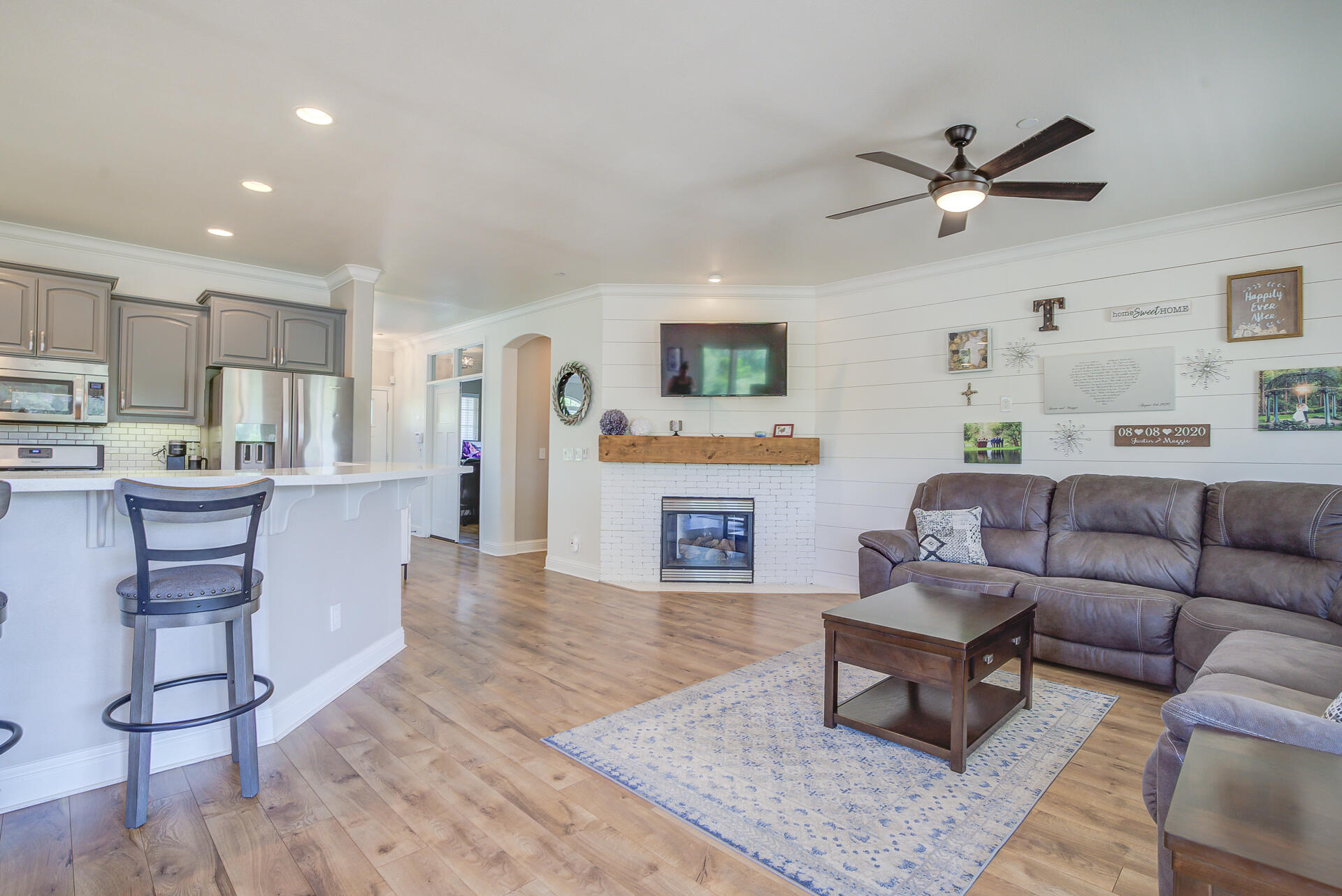 4090 Cambria Drive Redding, CA 96002 - Photo 17 of 48 a living room with furniture and kitchen view