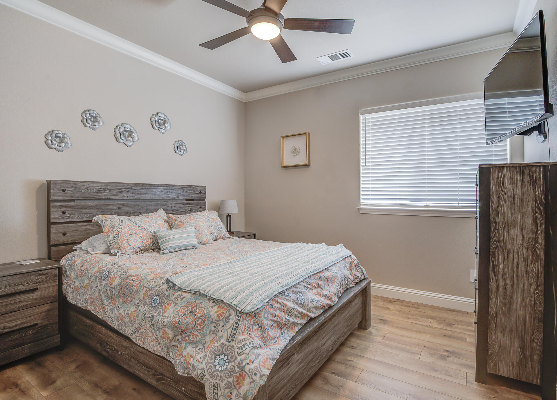 4090 Cambria Drive Redding, CA 96002 - Photo 26 of 48 a bedroom with a large bed and a window